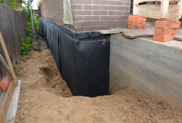 Happy homeowners after waterproofing job in Georgetown